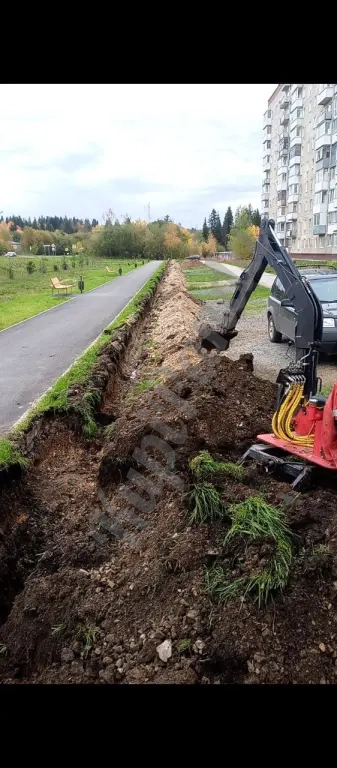 Мини экскаватор прицепной