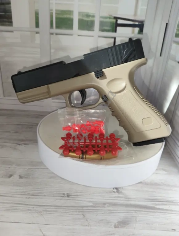 Игрушка Пистолет игрушечный Глок с мягкими пульками и гильзы в комплекте, для мальчиков) Glock